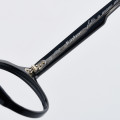 Thin eyeglasses with a hexagonal shape model, temples detail