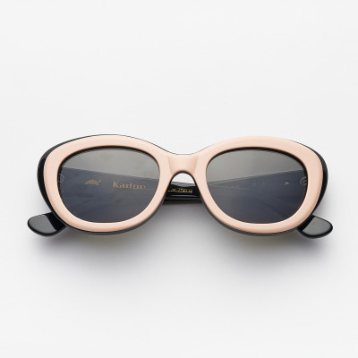 Vintage women's pink and black sunglasses