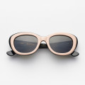 Vintage women's pink and black sunglasses