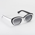 Vintage women's white and black sunglasses