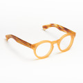 Optical frame Round and thick Mondo model honey with striped honey temples color